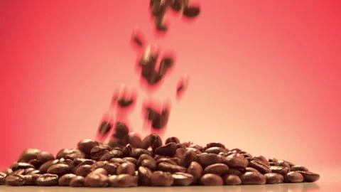 Pouring roasted coffee beans to table red background 50fps Stock-Footage 156251814