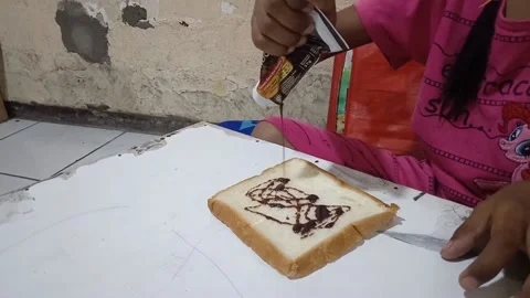 Pouring sachet milk into white bread Stock Footage 219180438