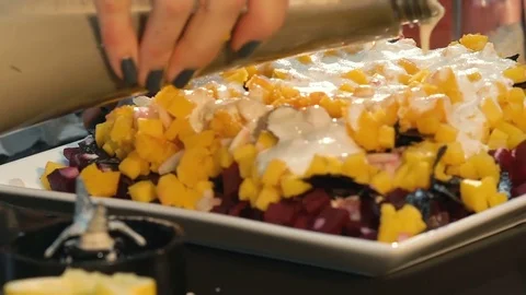 Pouring salad with sauce Video stock 82025401