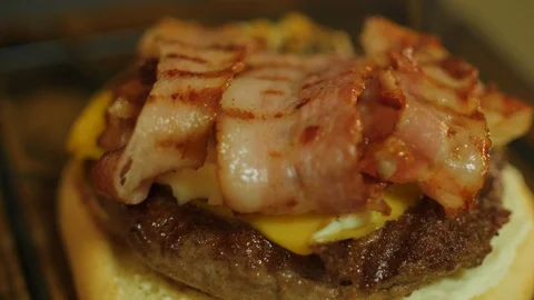 Pouring Sauce on a Cheeseburger Stock Footage 95186070