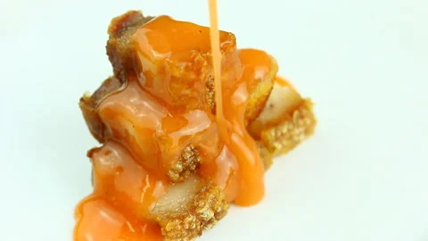 Pouring sauce on crispy pork , in studio Chiangmai Thailand. Stock-Footage 151432507