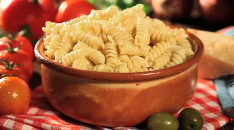 Pouring sauce on pasta Stock Footage 5090332