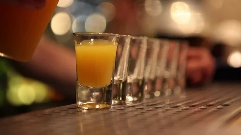 Pouring a short drink Stock Footage 72228585