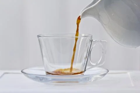 Pouring a small amount of coffee Stock Photos