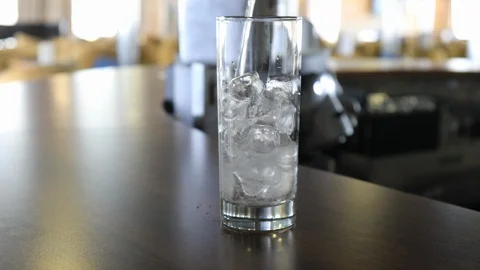 Pouring a soda in a highball Stock Footage 105018338