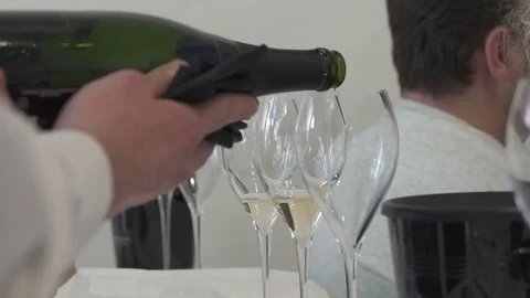 Pouring sparkling white wine Stock Footage 82024728