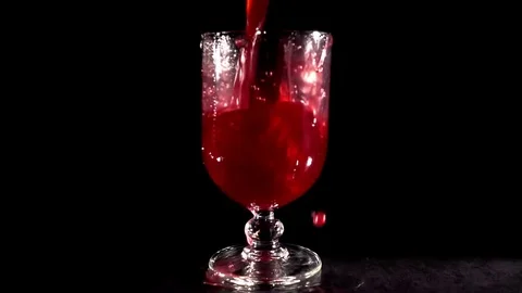 Pouring strawberries juice Stock Footage 82025367