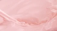 Pouring Strawberry Flavored Milk. Slow Motion. Stock Footage