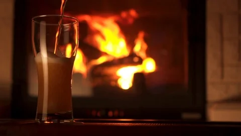 Pouring stream into glass bocal of refreshment beer with foam and air bubbles 動画素材 103549081