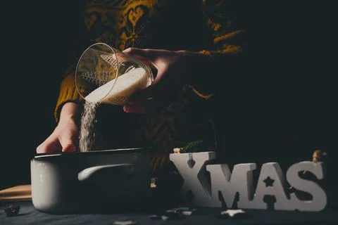 Pouring sugar into jam pot Stock Photos