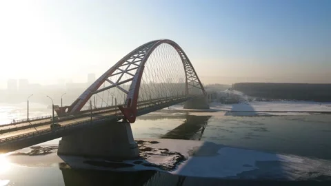Pouring sunlight over the bases of the bridge. Span near the Novosibirsk Bridge Stock Footage 145306851