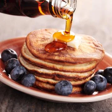 Pouring syrup Stock Photos