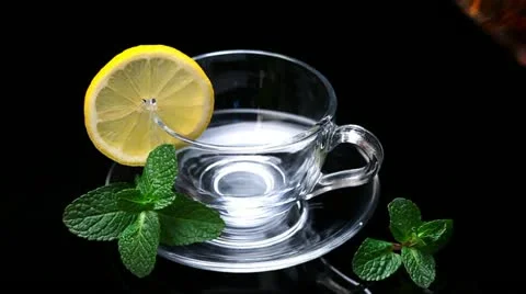 Pouring tea into cup Stock-Footage 20644808