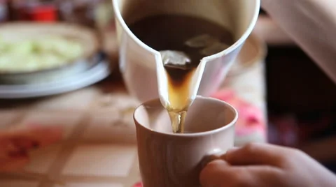 Pouring tea into a cup Stock Footage 41683572