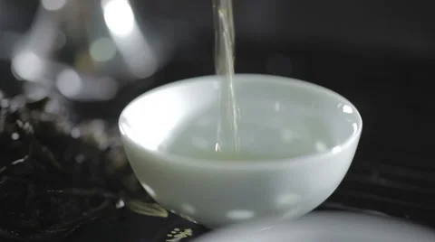 Pouring tea in a cup Stock Footage 58304329