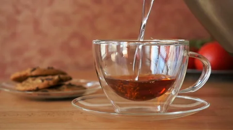 Pouring tea into a cup Stock Footage 65748847