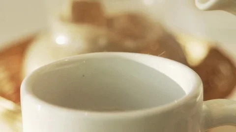Pouring tea into cup Video stock 75171362