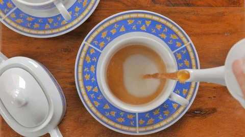 Pouring tea in a cup Stock Footage 101157634