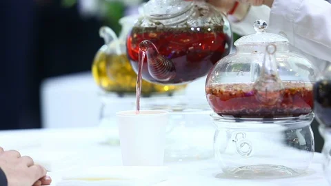 Pouring tea into a paper Cup Stock Footage 129273822