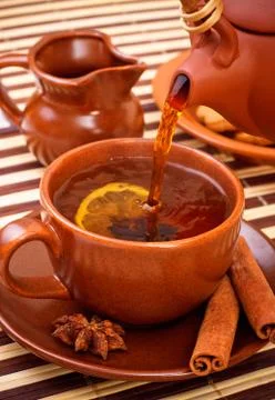 Pouring tea Stock Photos
