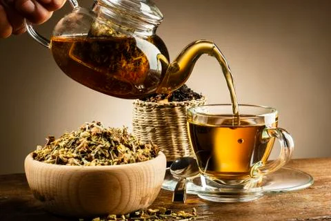 Pouring tea Stock Photos