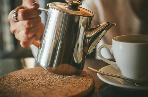 Pouring tea Stock Photos
