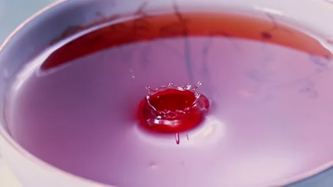 Pouring Tea in Tea Cup on the Table Super slow motion 1000fps Stock Footage 130984746