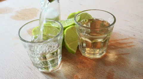 Pouring tequila shots 4K Stock Footage 47213292