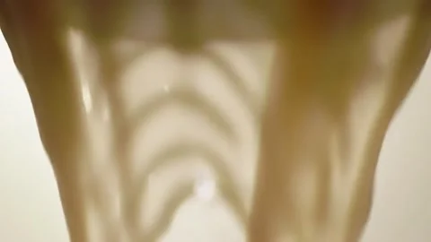 Pouring Thick Creamy Liquid in Kitchen Closeup Slow Motion Stock Footage 313324266