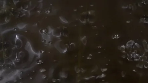 Pouring through Splash of black Fuel Oil. 库存影片 82624919