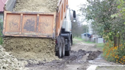 Pouring a Tipper sand on the road Stock Footage 75266716