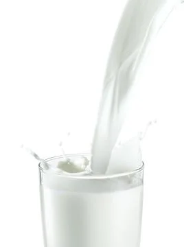 Pouring two glass of milk creating splash, isolated on a white background Stock-Fotos
