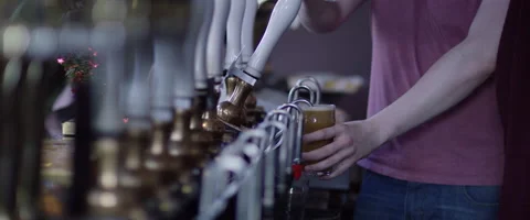 Pouring two pints of beer Stock Footage 59946133