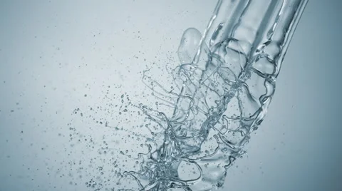 Pouring water and making splashes. Slow Motion. Stock Footage 55883203
