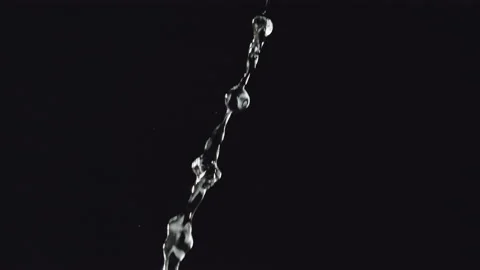 Pouring Water Falling on Black background in Slow Motion Stock Footage 159560149
