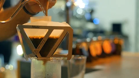 Pouring water into a filter, making Colombian coffee in Medellin, Colombia Vídeo Stock 101722059