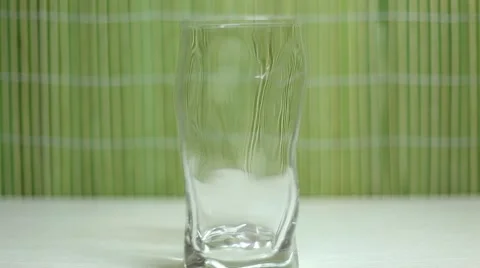 Pouring water into glass Stock Footage 47166589