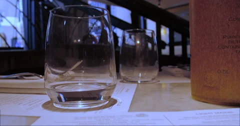 Pouring water in a glass Stock Footage 67353801