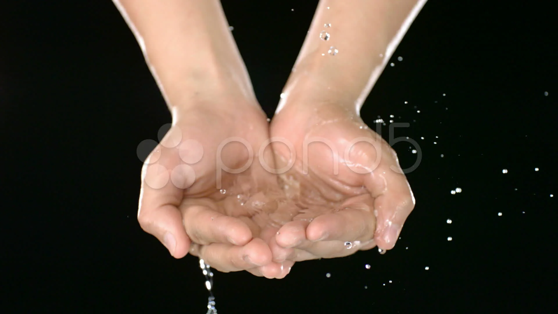 hand pouring water