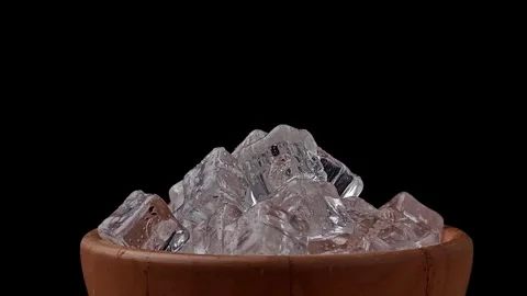 Pouring water into ice cubes. Stock Footage 306003783