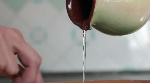Pouring water from the jar Stock Footage 62277600