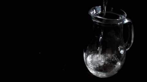 Pouring Water into Jug Stock Footage 32007435