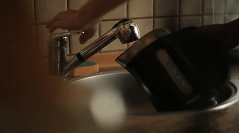 Pouring water into the kettle Video stock 42179310