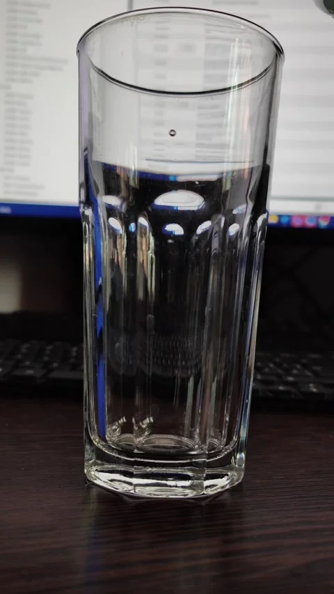 Pouring water in office Video stock 285729680