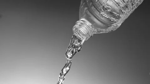 Pouring water out of plastic bottle, Slow Motion Stock Footage 31819604