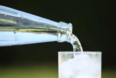 Pouring water Stock Photos