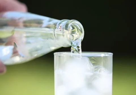 Pouring water Stock Photos