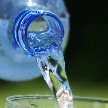 Pouring water Stock Photos