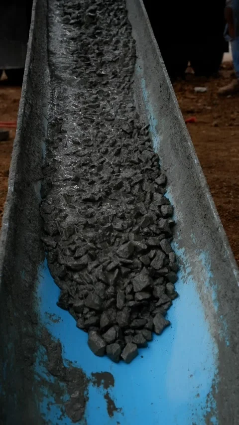 Pouring Wet Concrete into a Formwork Channel at a Residential Construction Site, Stock Footage 320164596