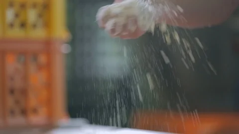 Pouring White Flour On A Table To Cook Bread Or Bakery, Closeup. 库存影片 89575755